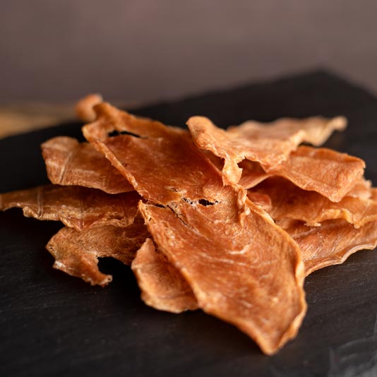 All of our chicken jerky treats are handmade with only the finest ingredients. We start with lean, organic chicken breast, then, we slow dry the chicken until it is perfectly tender.