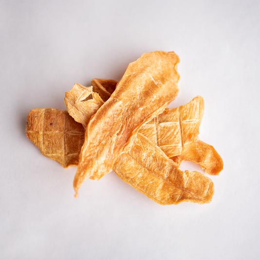 All of our chicken jerky treats are handmade with only the finest ingredients. We start with lean, organic chicken breast, then, we slow dry the chicken until it is perfectly tender. Our Big Bites are just a little thicker then regular chicken jerky.